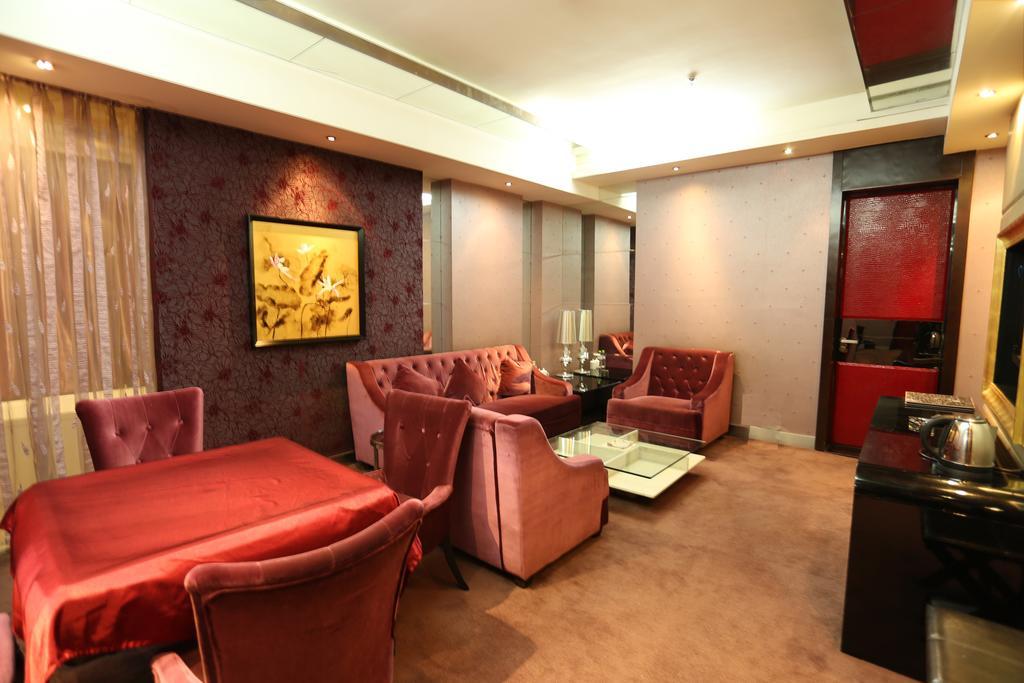 Harbin Yakelai Holiday Hotel Номер фото