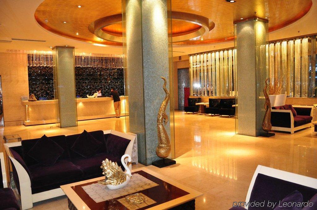 Harbin Yakelai Holiday Hotel Интерьер фото