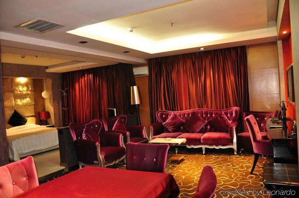 Harbin Yakelai Holiday Hotel Номер фото
