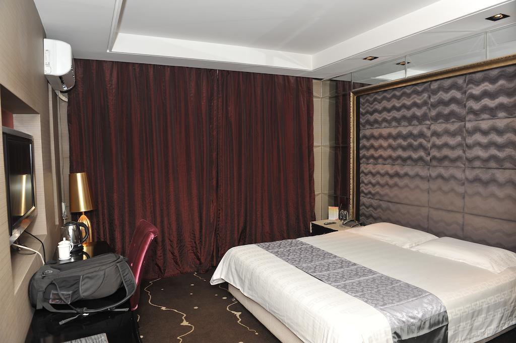 Harbin Yakelai Holiday Hotel Номер фото