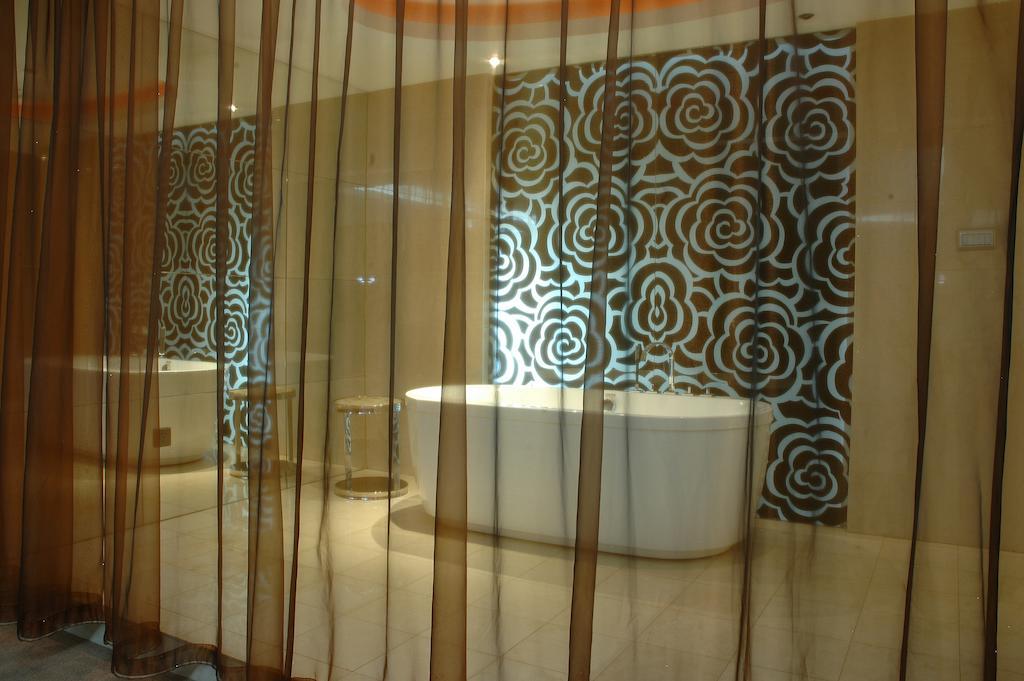 Harbin Yakelai Holiday Hotel Номер фото