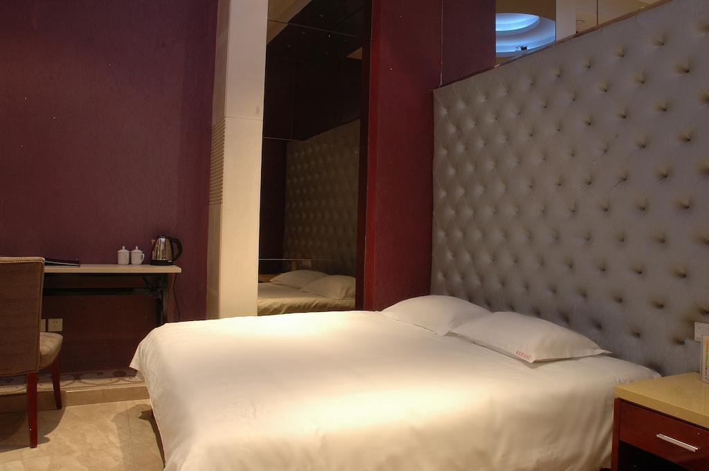 Harbin Yakelai Holiday Hotel Номер фото