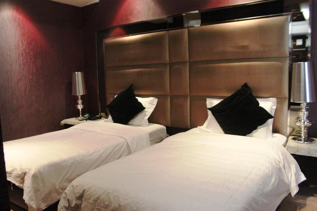 Harbin Yakelai Holiday Hotel Номер фото